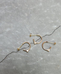 K10Symbol Hoop DIA S Pierced
